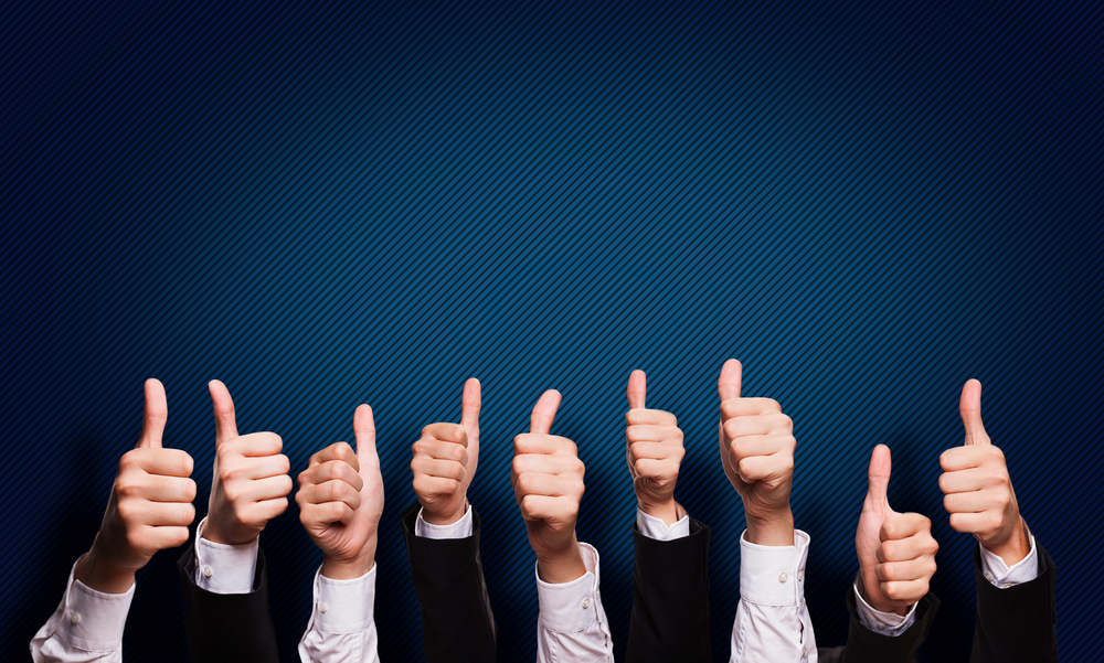 Many Thumbs In The Air For Client Success