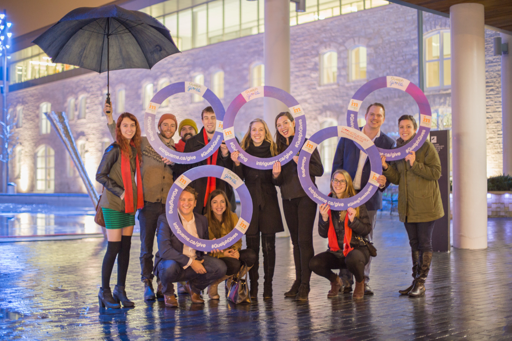 Intrigue Team with the Giving Ring outside Guelph City Hall on Giving Tuesday