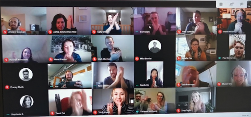 Intrigue team clapping on a video call